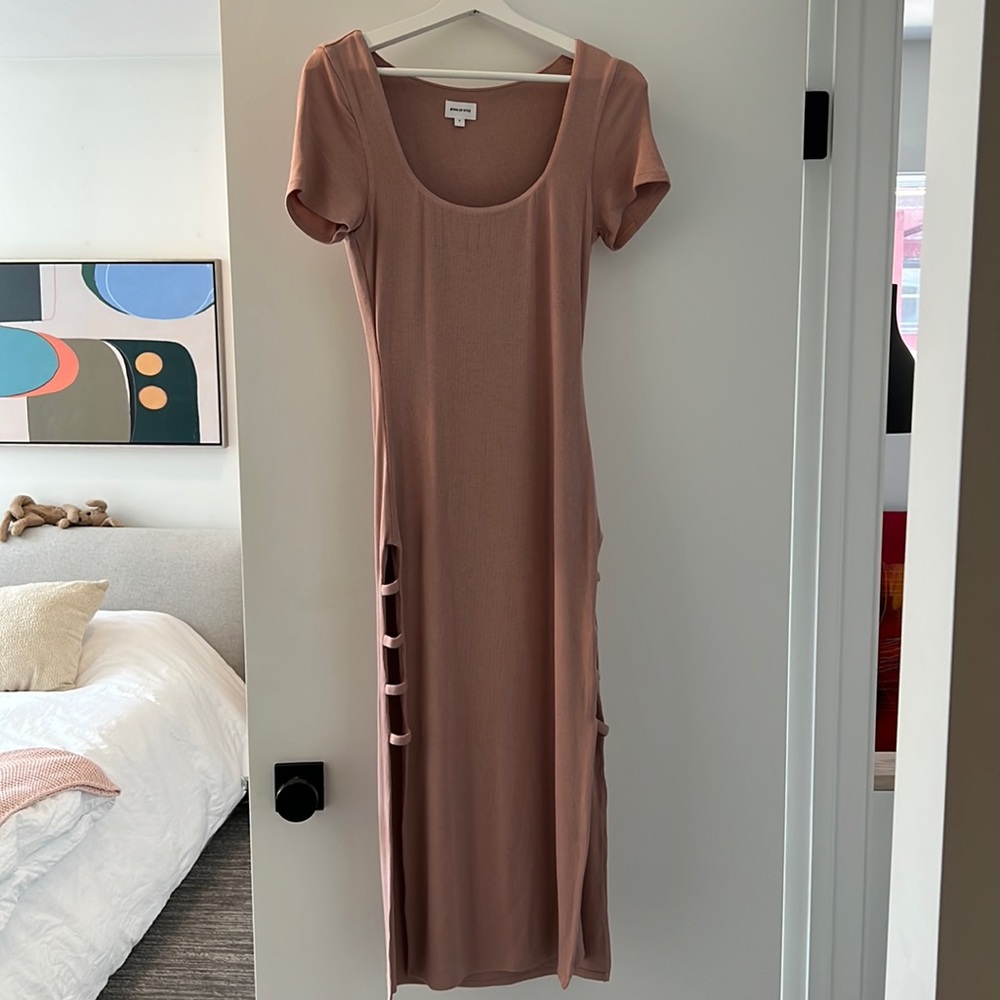Perfect cut out dress so flattering on! Never worn!